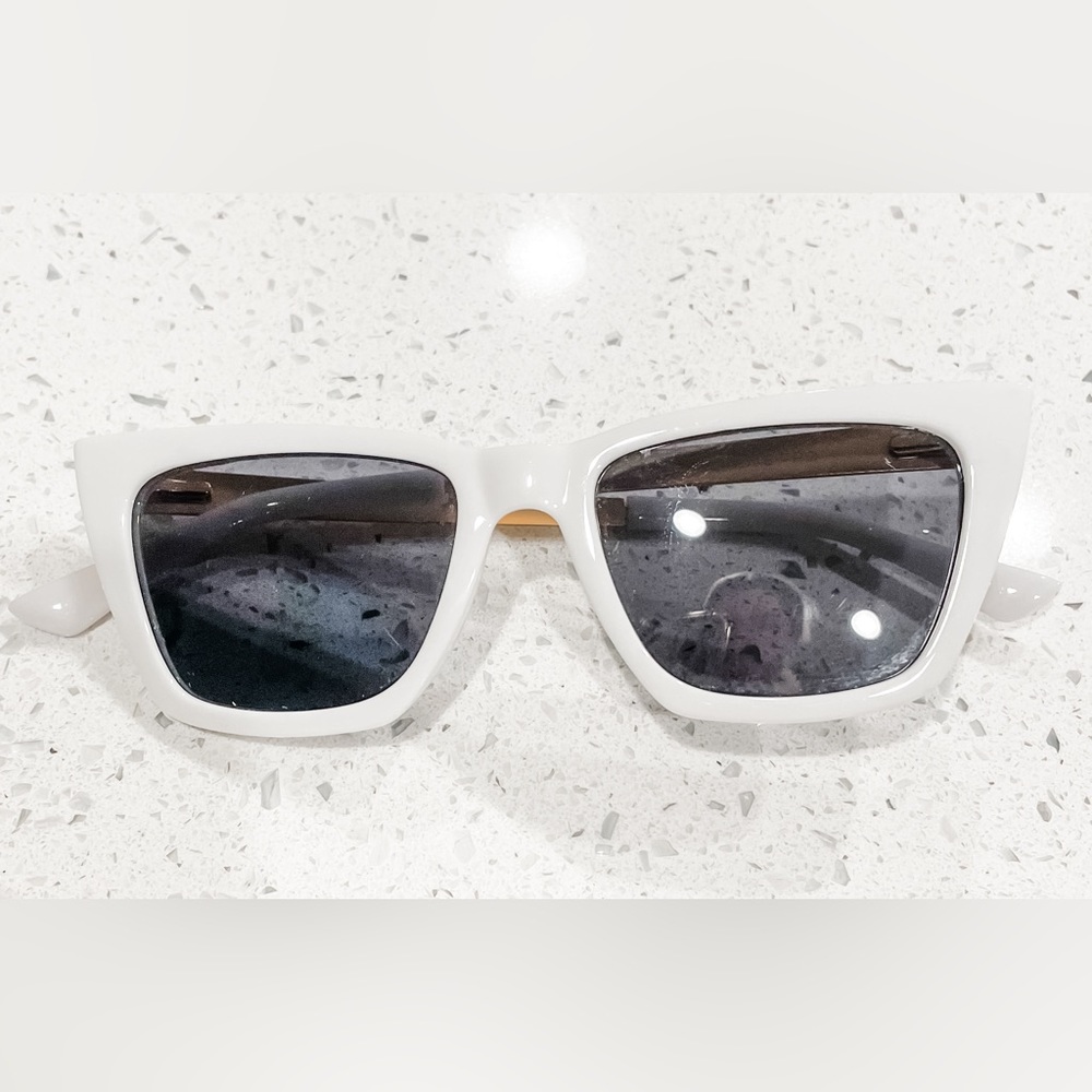 White and gold sunglasses